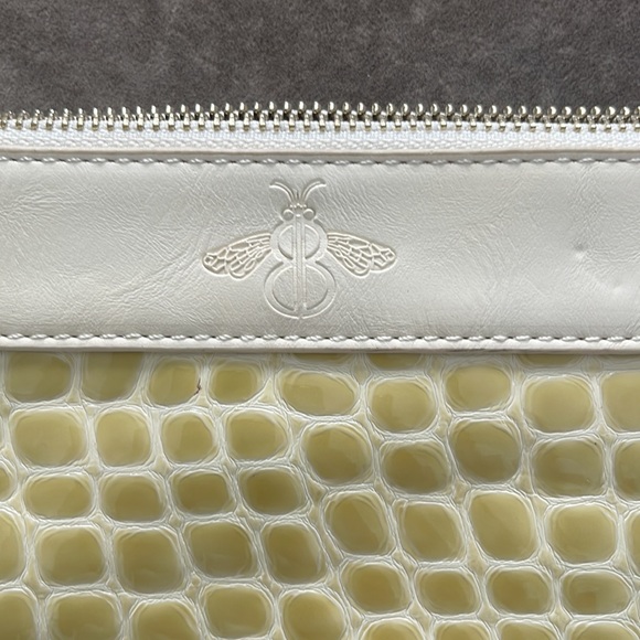 Bumble Bee clutch with wrist band. Color cream. Faux reptile design. Zip top - Picture 7 of 8